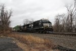 NS 4767 takes train 260 down the siding